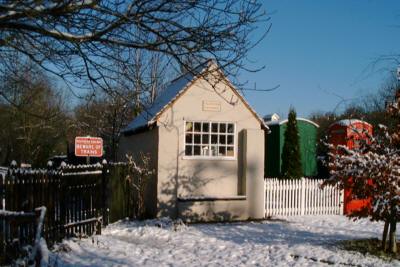 Amberley museum telephone exchange in in the snow at Christmas