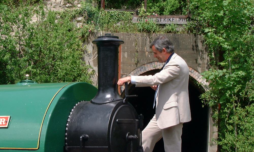 Howard Stenning rides Peter the steam engine at Amberley Museum.