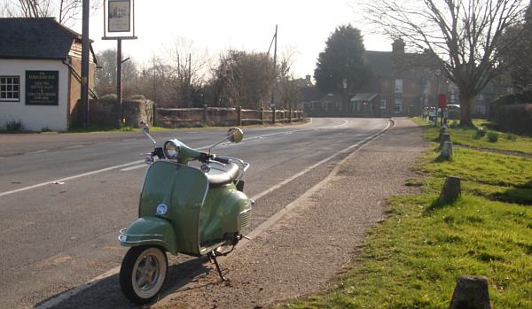 Retro-styled Vespa - like scooter in Ashurst opposite the Fountain Inn