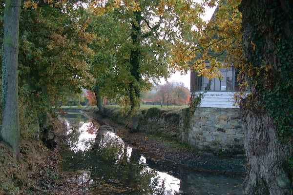 The moat in Autumn at Sissinghurst