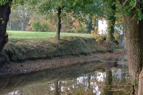 The moat in Autumn at Sissinghurst