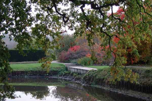 The moat in Autumn at Sissinghurst