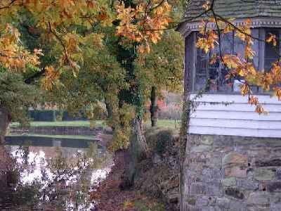 The moat in Autumn at Sissinghurst
