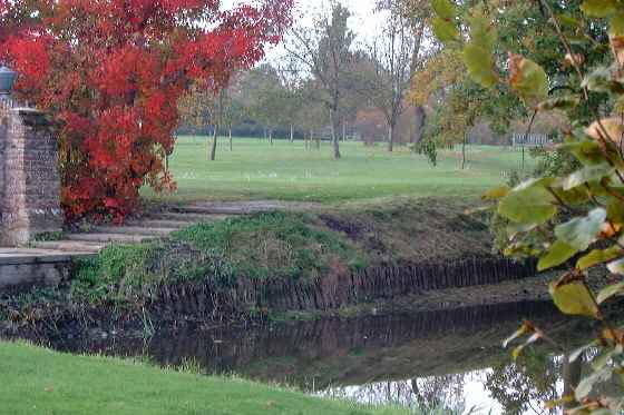 The moat in Autumn at Sissinghurst