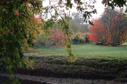The moat in Autumn at Sissinghurst