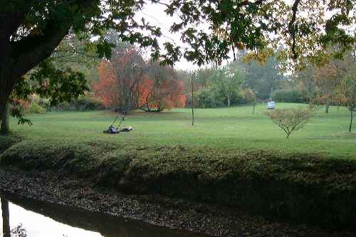 The moat in Autumn at Sissinghurst