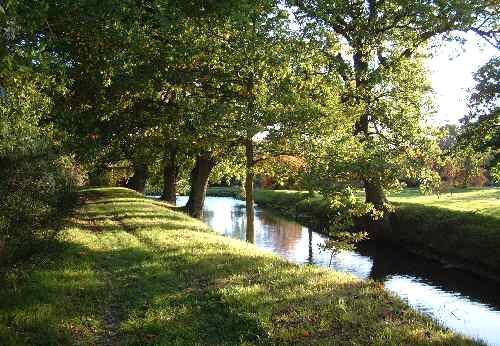The moat in Autumn at Sissinghurst