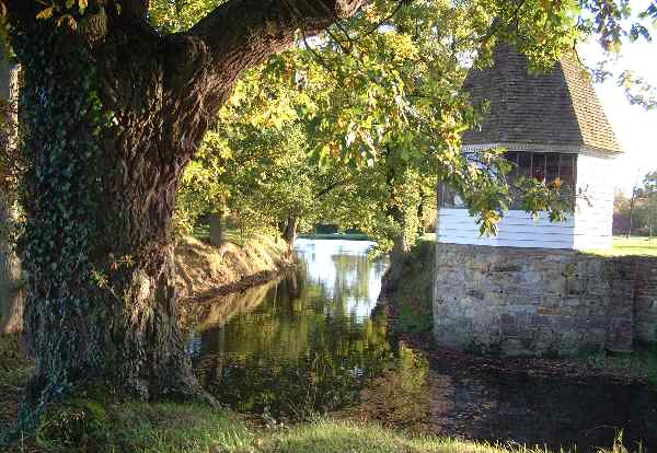 The moat in Autumn at Sissinghurst